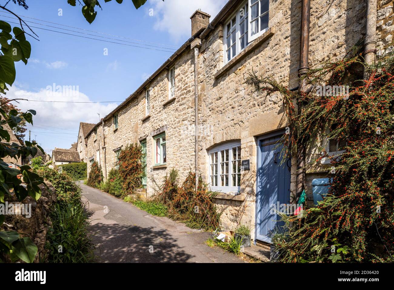 A row of stone cottages in the Cotswold village of Bisley, Gloucestershire UK Stock Photo