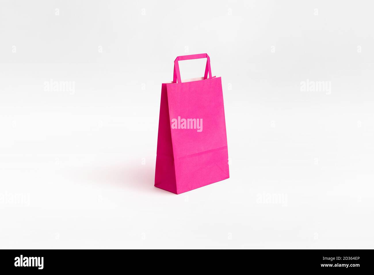 fucsia paper bag with flat handles Stock Photo