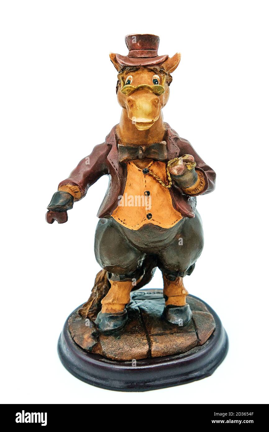 Statue of a horse in a suit and with a clock. White background, isolate