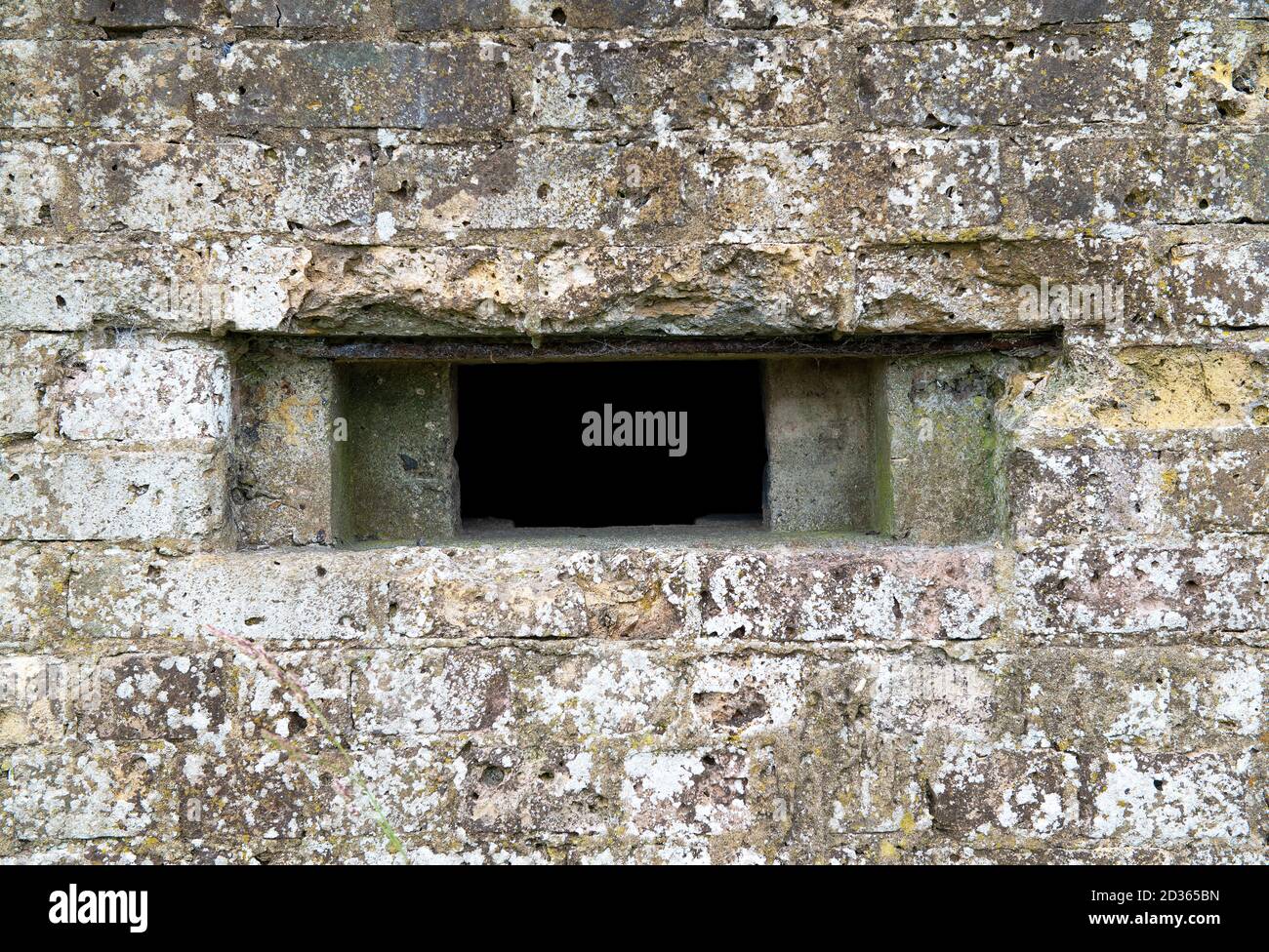 Close up of lookout window on a World War Two concrete pillbox / bunker. Stock Photo