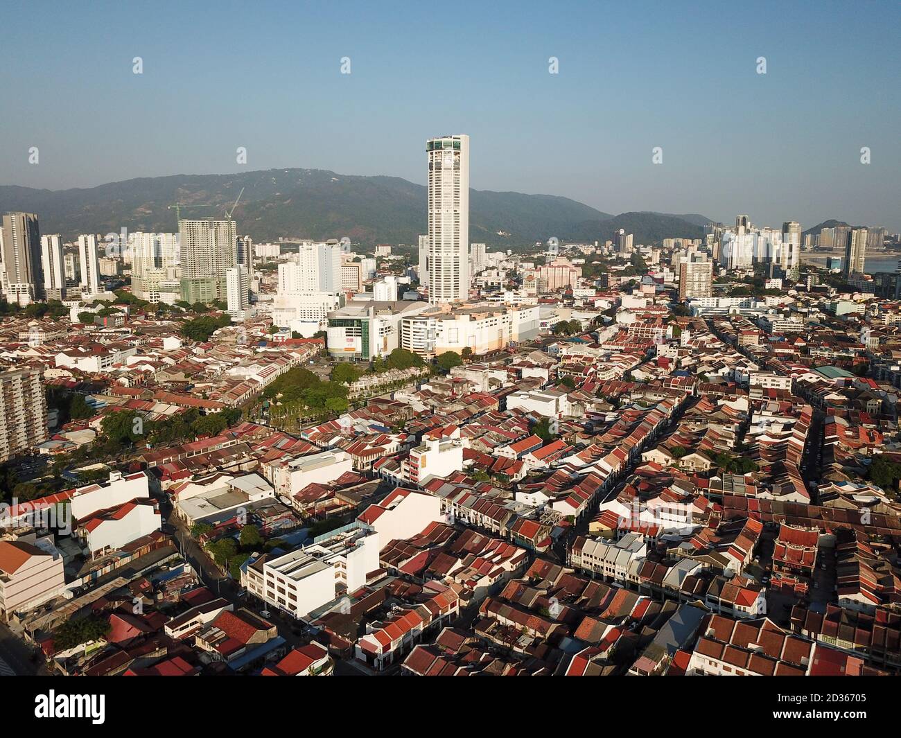 Georgetown, Penang/Malaysia - Feb 29 2020: Aerial view old house at Georgetown. Background is KOMTAR building. Stock Photo