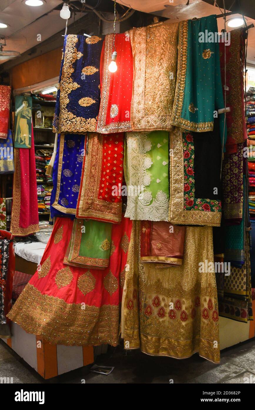 DELHI, INDIA MAY 14 Sales man at shop selling traditional Indian
