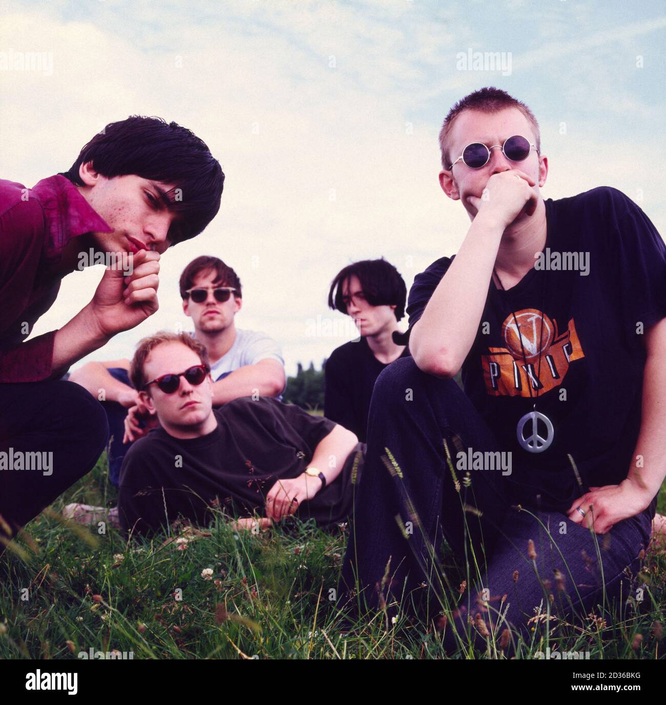 Radiohead 1992. Early portrait of band in a field outside Oxford. Shot for Lime Lizard magazine Stock Photo