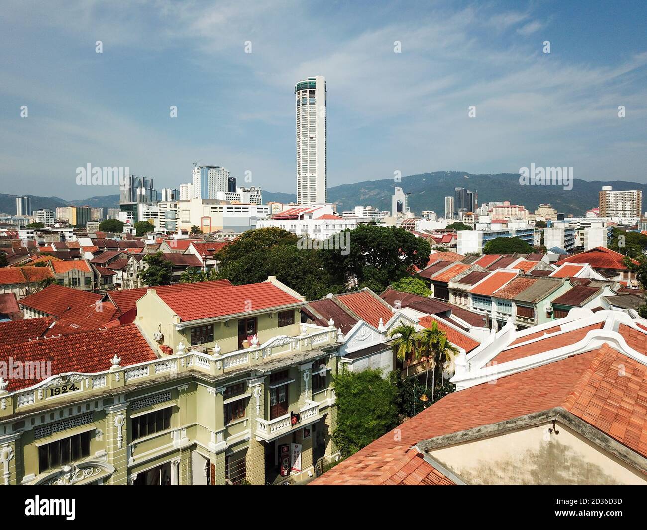 Rooftop heritage house with background KOMTAR building. Stock Photo