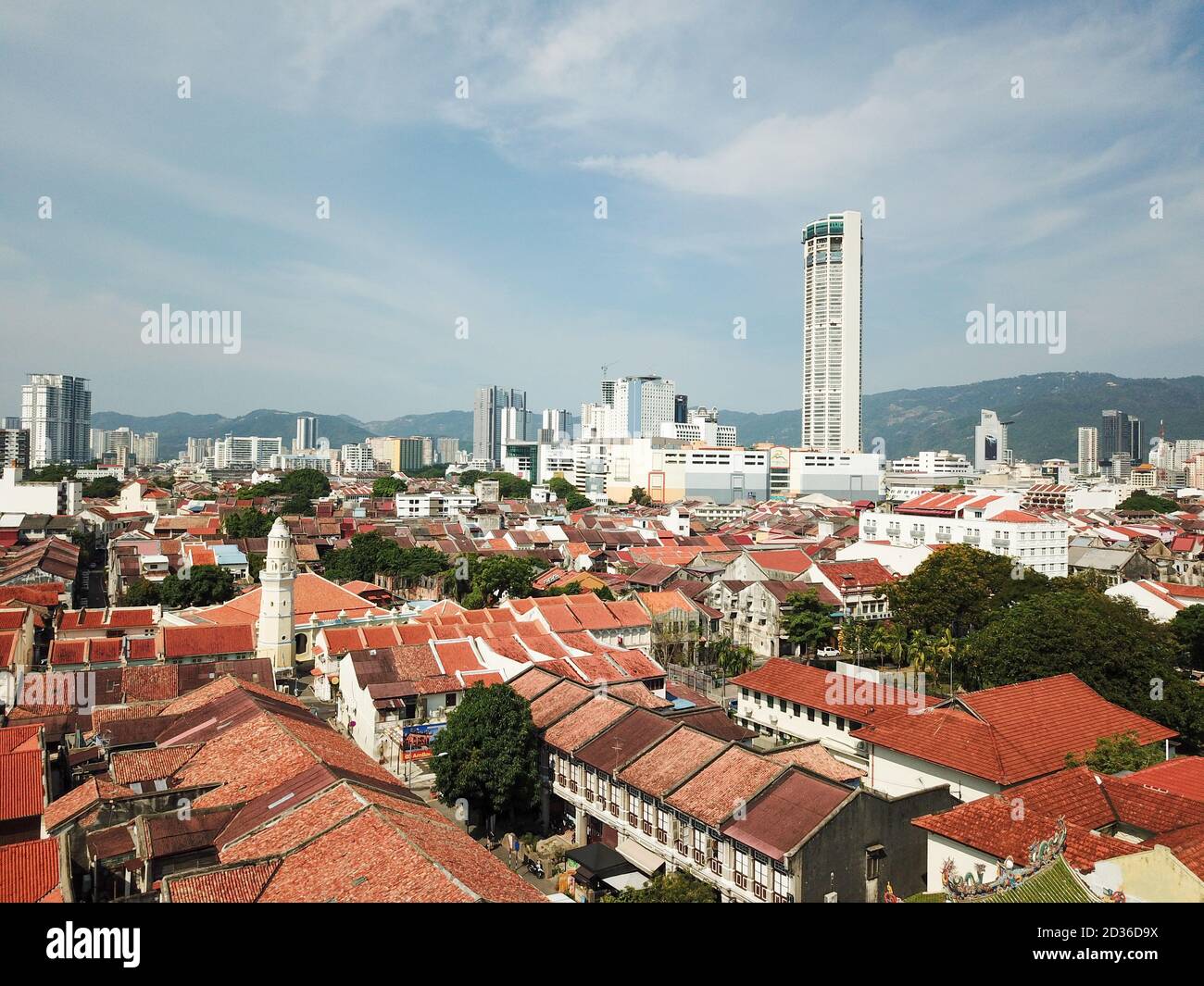 Georgetown, Penang/Malaysia - Mar 17 2020: Aerial view rooftop of old shop heritage house with KOMTAR at back. Stock Photo