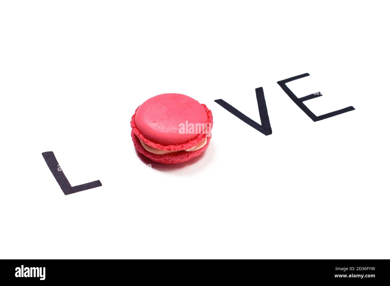 Love. Macaroon and hand lettering. Sweet love concept. Stock Photo