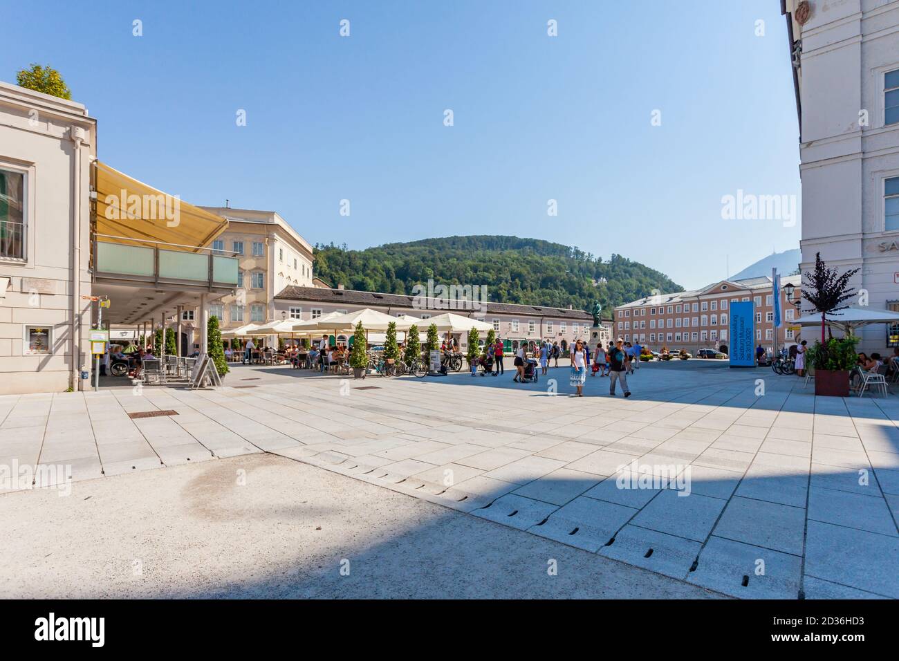 Mozartplatz, a historic landmark in central Salzburg. It is a square best known for its memorial statue of composer Wolfgang Amadeus Mozart. Stock Photo
