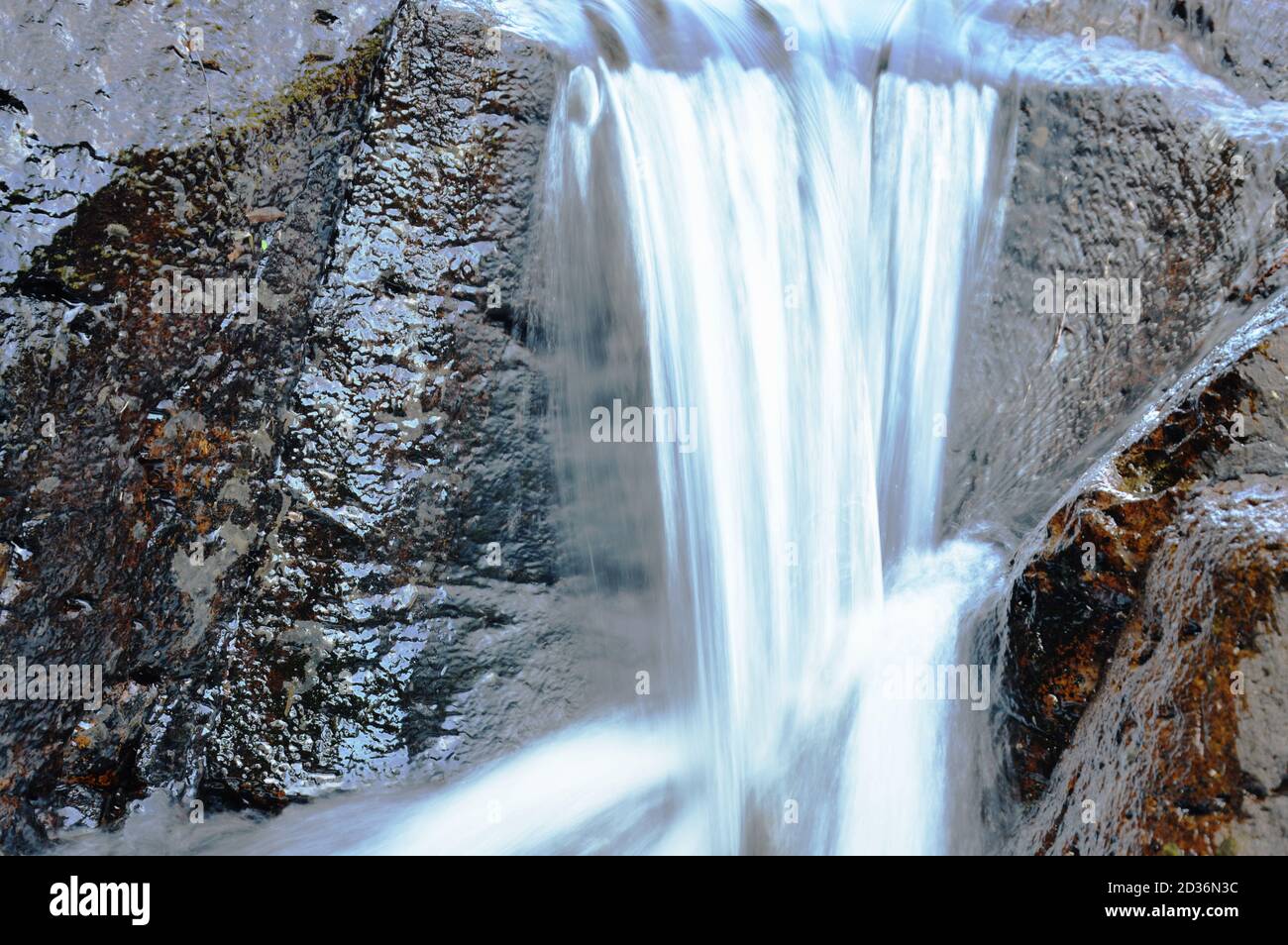 water falling on river pass rock and stone in forest Stock Photo - Alamy