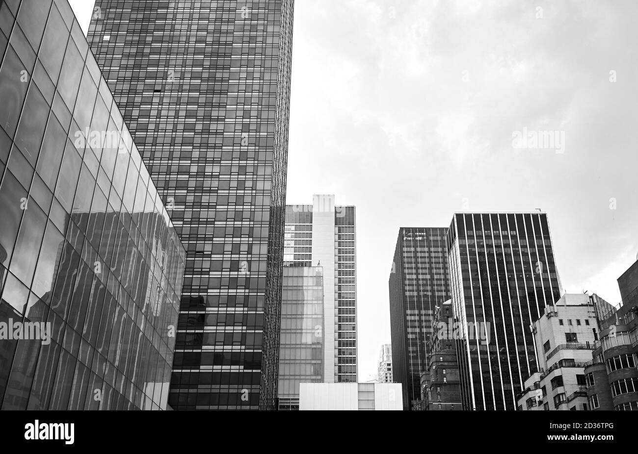 Black and white picture of New York City modern architecture on a cloudy day, USA. Stock Photo
