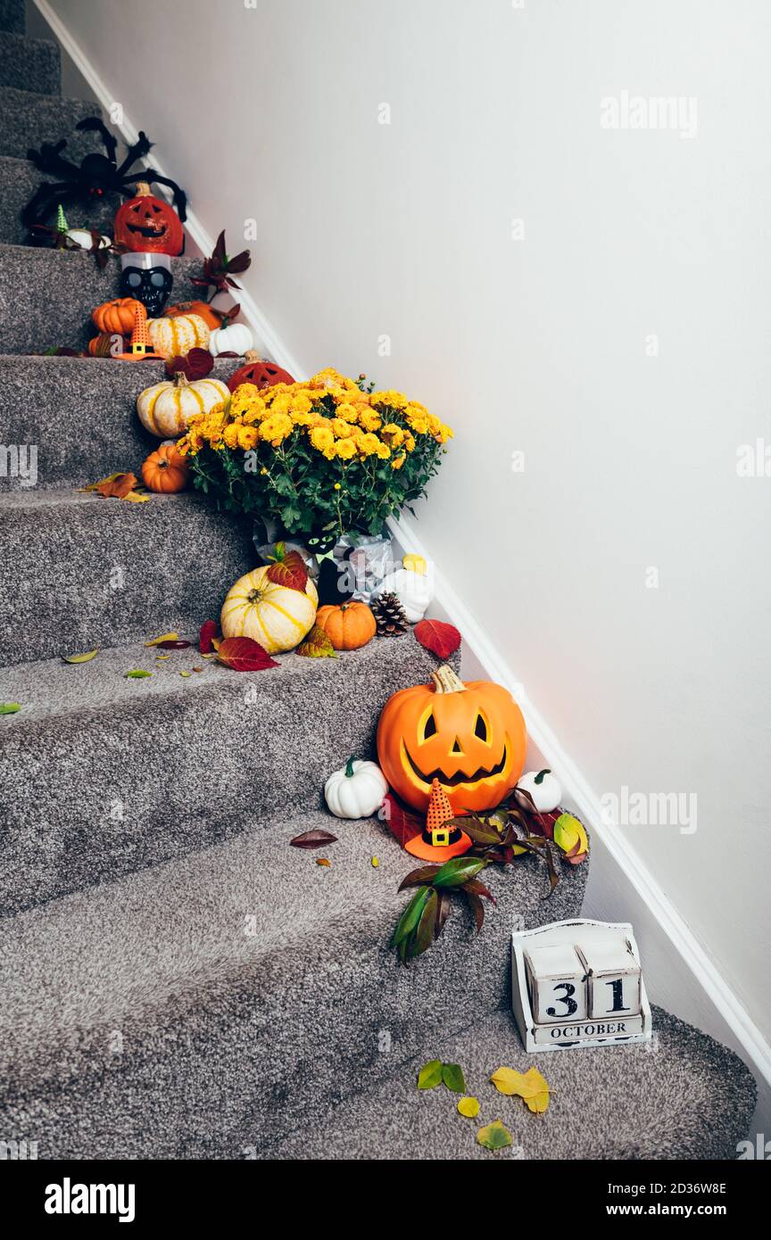 Pumpkins and decorations on stairs Stock Photo