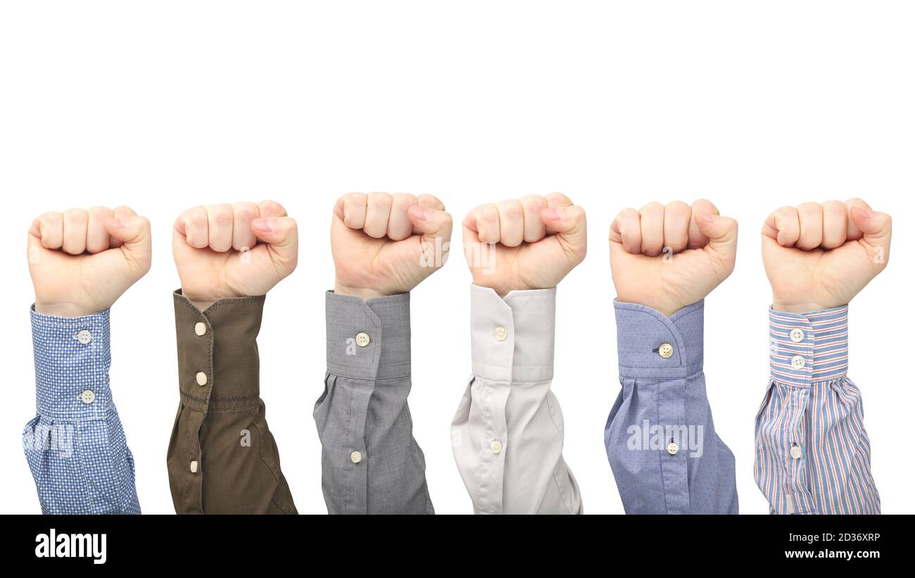 Male hands in fists in different shirts on white background. Protest and indignation. Hand gesture signals Stock Photo