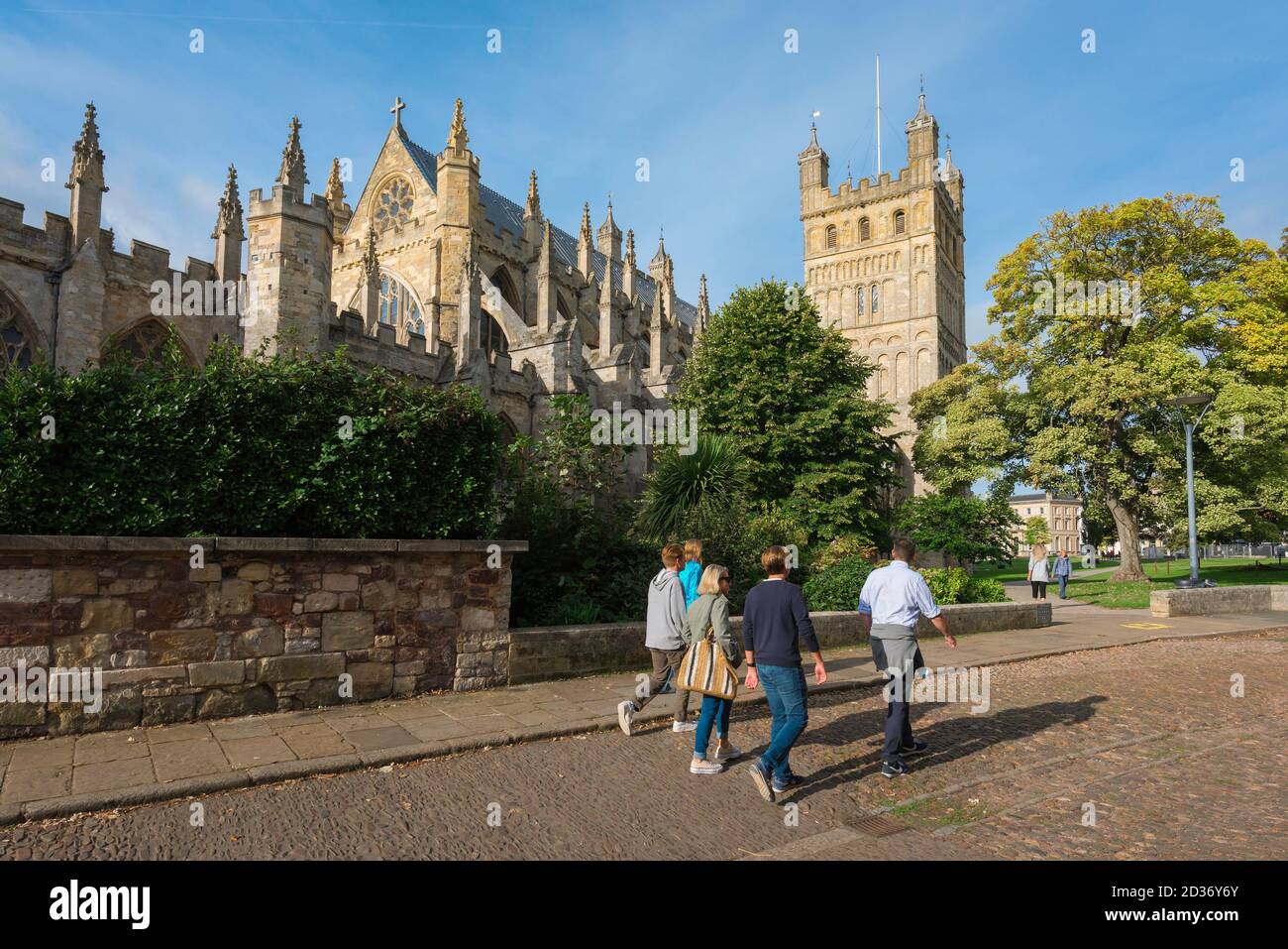Cathedral Exeter, view in summer of people in the Cathedral Close looking at the north side of the Cathedral of St Peter in Exeter, Devon, England Stock Photo