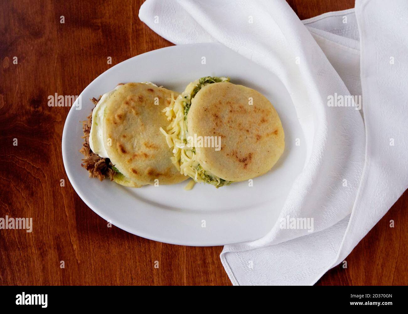 Venezuelan Arepas In Budare On Tablecloth Stock Photo - Download