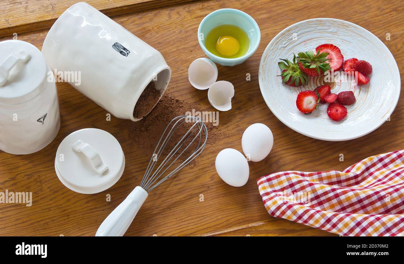 Ingredients for baking on wood counter top Stock Photo Alamy