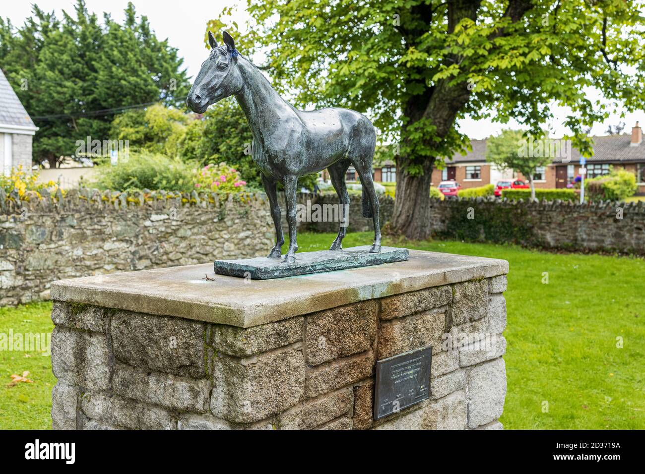 Commemorative bronze statuettes of horses in Sant Brigids park, Kill. Celebrating the success of father and son Ted and Ruby Walsh winning the Irish G Stock Photo