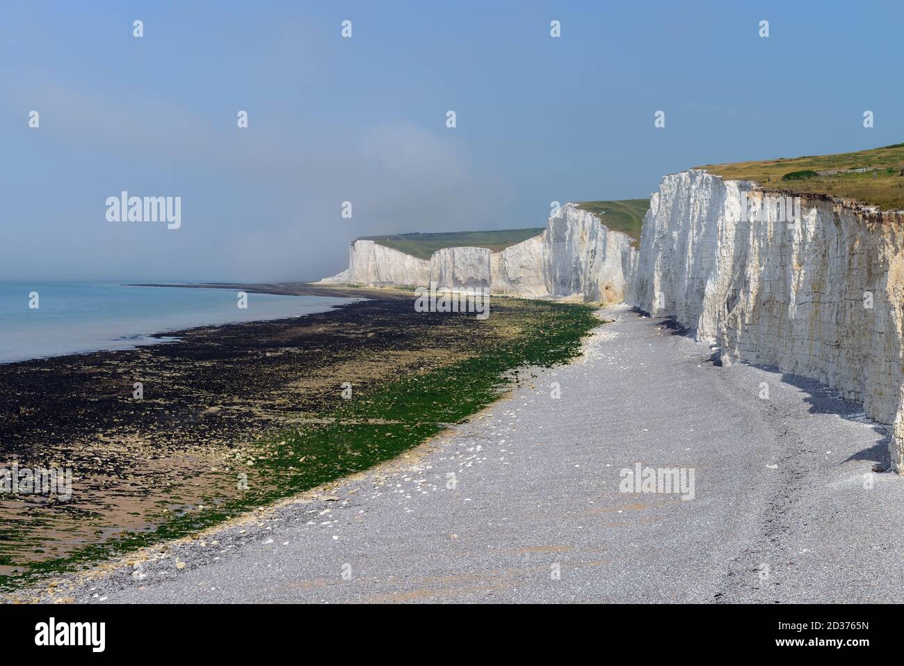 The Seven Sisters are a series of chalk cliffs next to the English Channel. They are part of the South Downs National Park in East Sussex, Stock Photo