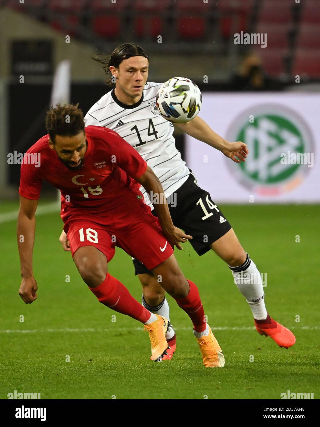 Cologne, Germany. 07th Oct, 2020. Football: international matches, Germany - Turkey in the RheinEnergieStadion. Nico Schulz (Germany) in action with Nazim Sangare (l, Turkey). Credit: Federico Gambarini/dpa/Alamy Live News Stock Photo