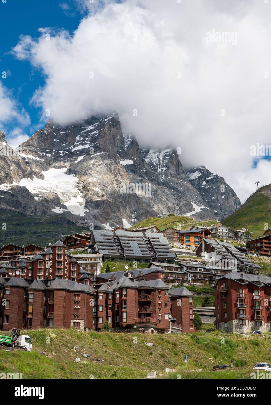 Picture of Alpine themed apartment mountain resort under high peaks Stock Photo ...