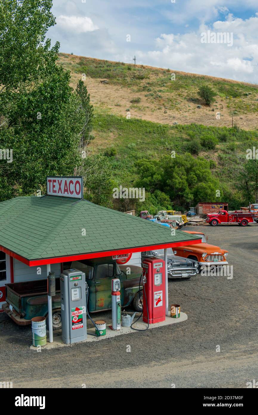 An old gas station with old car collection at a farm near Colfax in