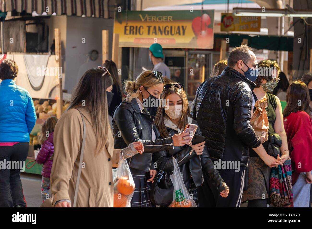Montreal, CA - 4 October 2020: Customers wearing Coronavirus Face Masks at Marche Jean Talon Market Stock Photo