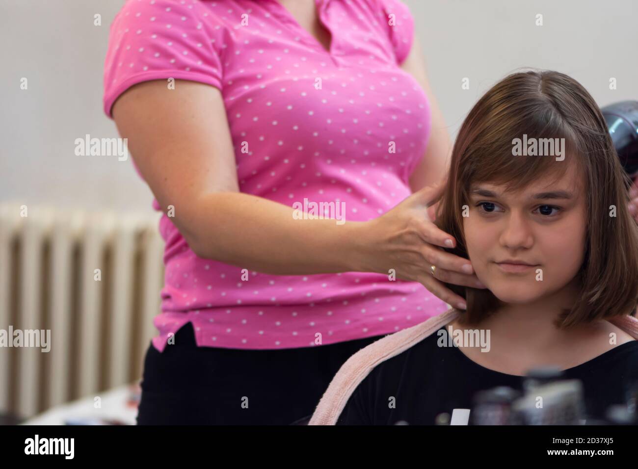 Portrait of young girl in hair salon Stock Photo - Alamy