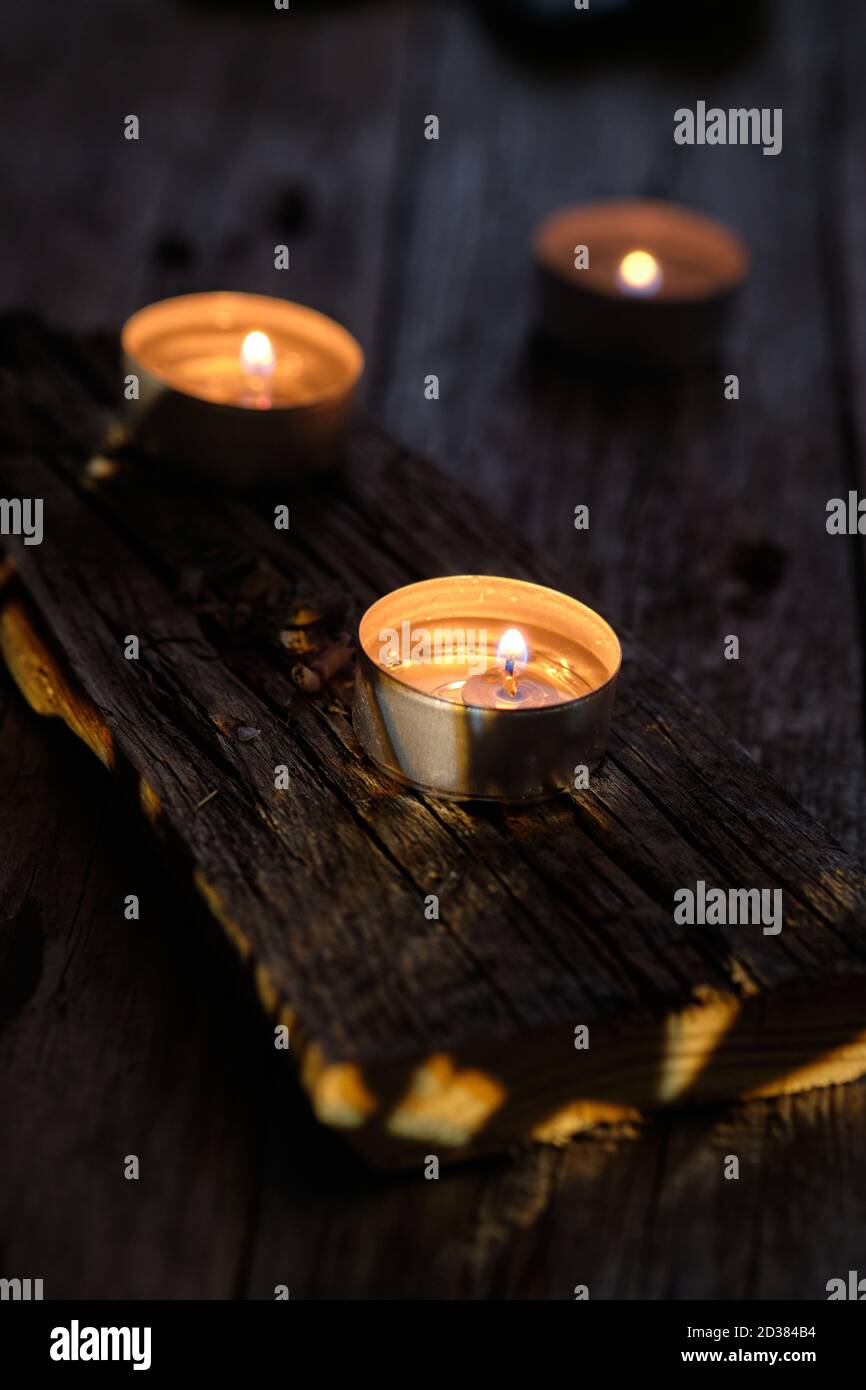 Three candles in a relaxing atmosphere Stock Photo