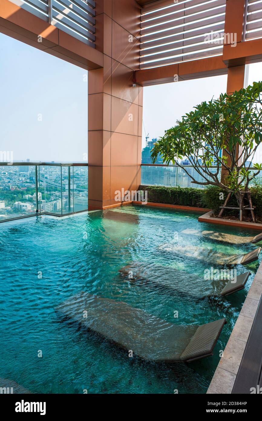 rooftop swimming pool at luxury condominium in Bangkok Stock Photo Alamy