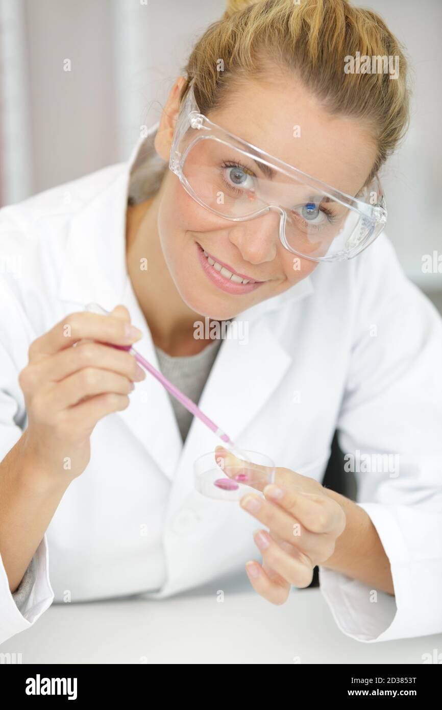 Blonde young woman in scientist hi-res stock photography and images - Alamy