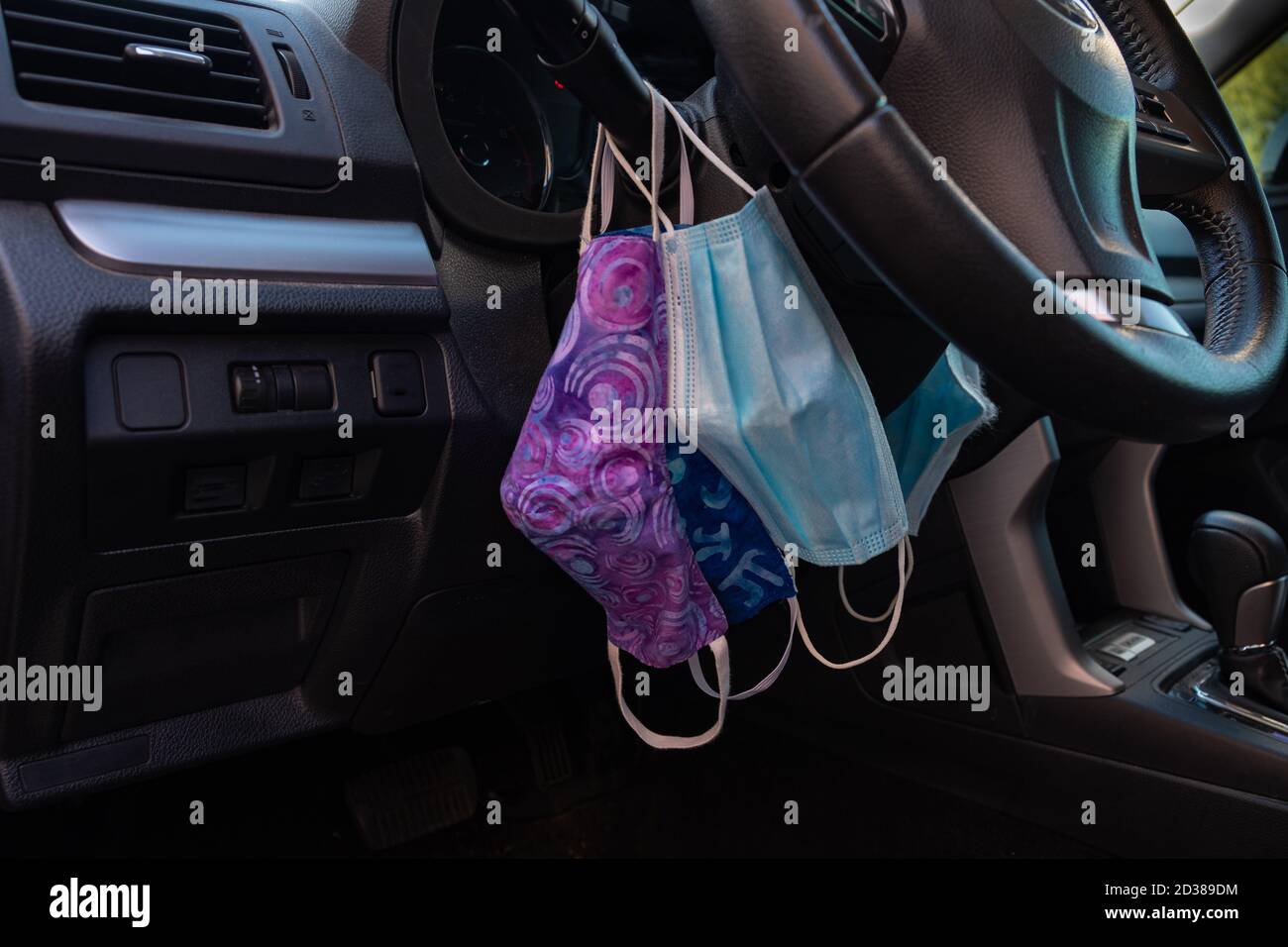 Driving in masks hi-res stock photography and images - Alamy