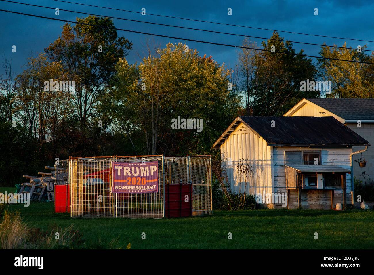 Milton, United States. 07th Oct, 2020. A Trump 2020 flag hangs from a dog kennel in rural Northumberland County near Milton, Pennsylvania on October 7, 2020. (Photo by Paul SWeaver/Sipa USA) Credit: Sipa USA/Alamy Live News Stock Photo