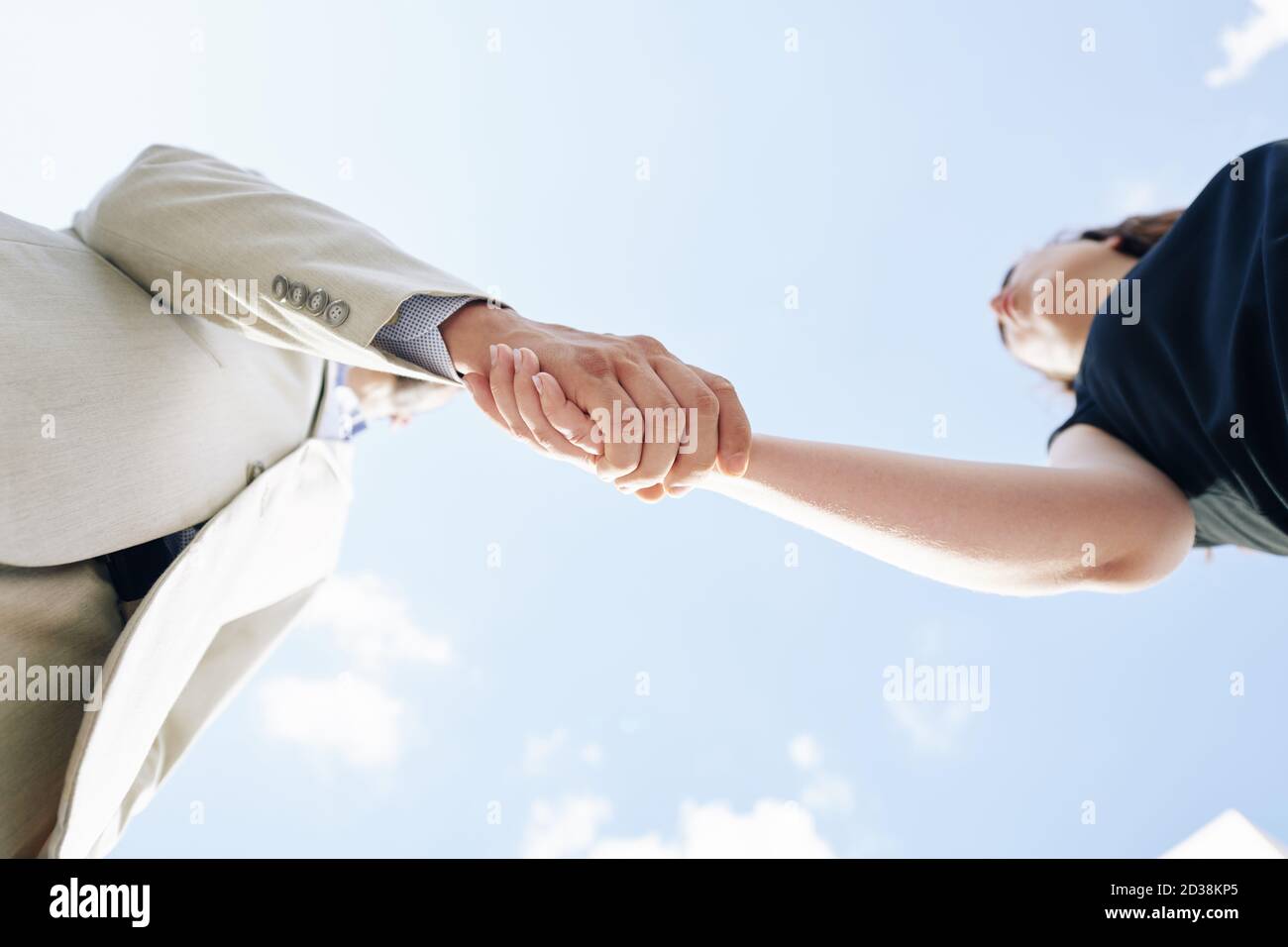 Business partners shaking hands Stock Photo