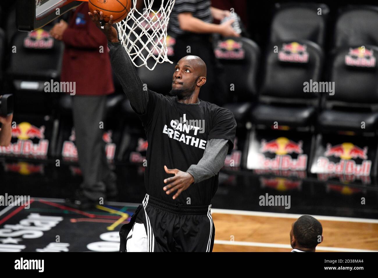 Brooklyn Nets forward Kevin Garnett (2) wears a 'I can't Breathe' t shirt to honor the fallen Eric Garner as he is introduced before the start of the Stock Photo