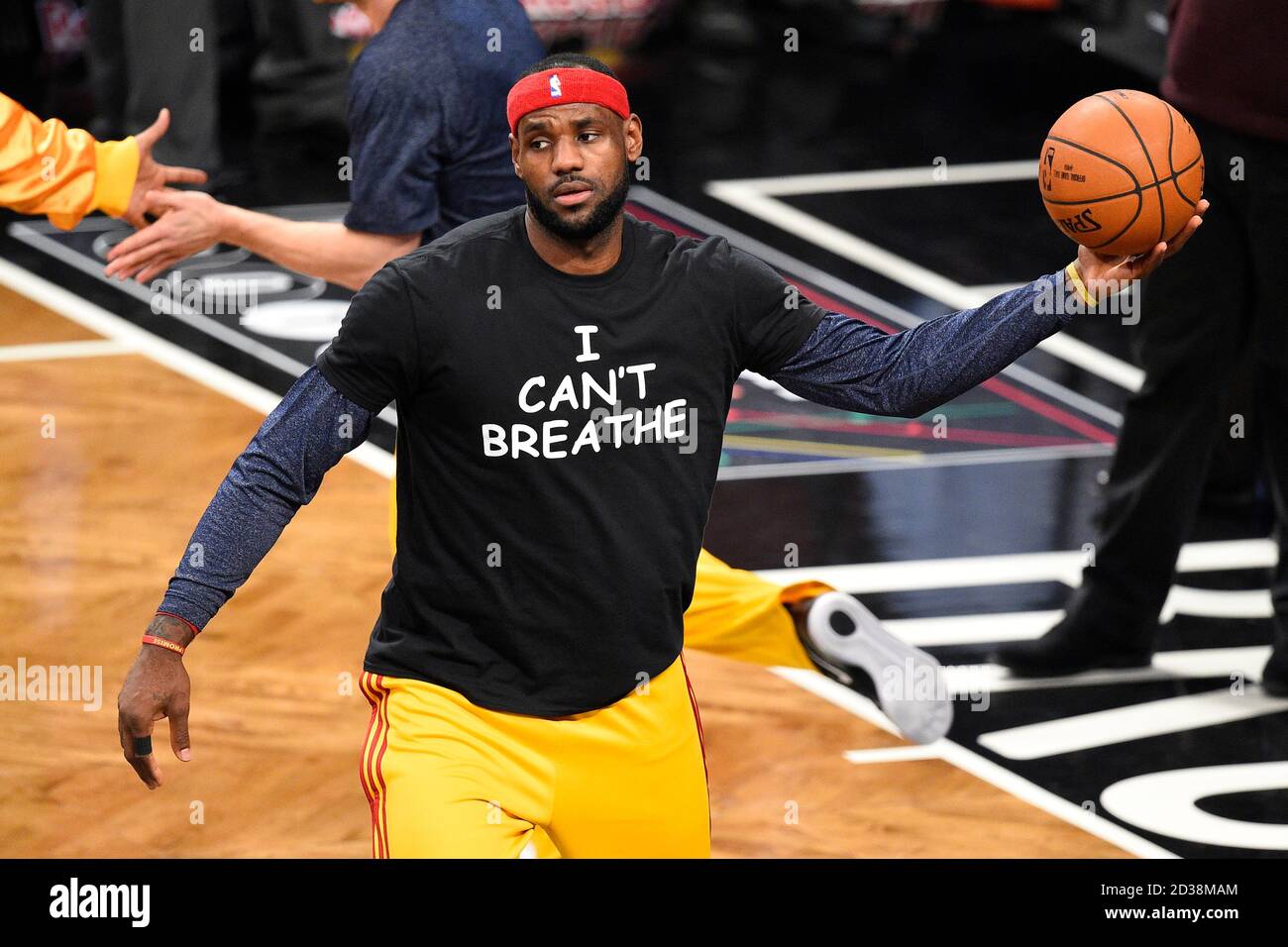 Cleveland Cavaliers forward LeBron James wears a 'I can't Breathe' t shirt to honor the fallen Eric Garner as he is introduced before the start of the Stock Photo