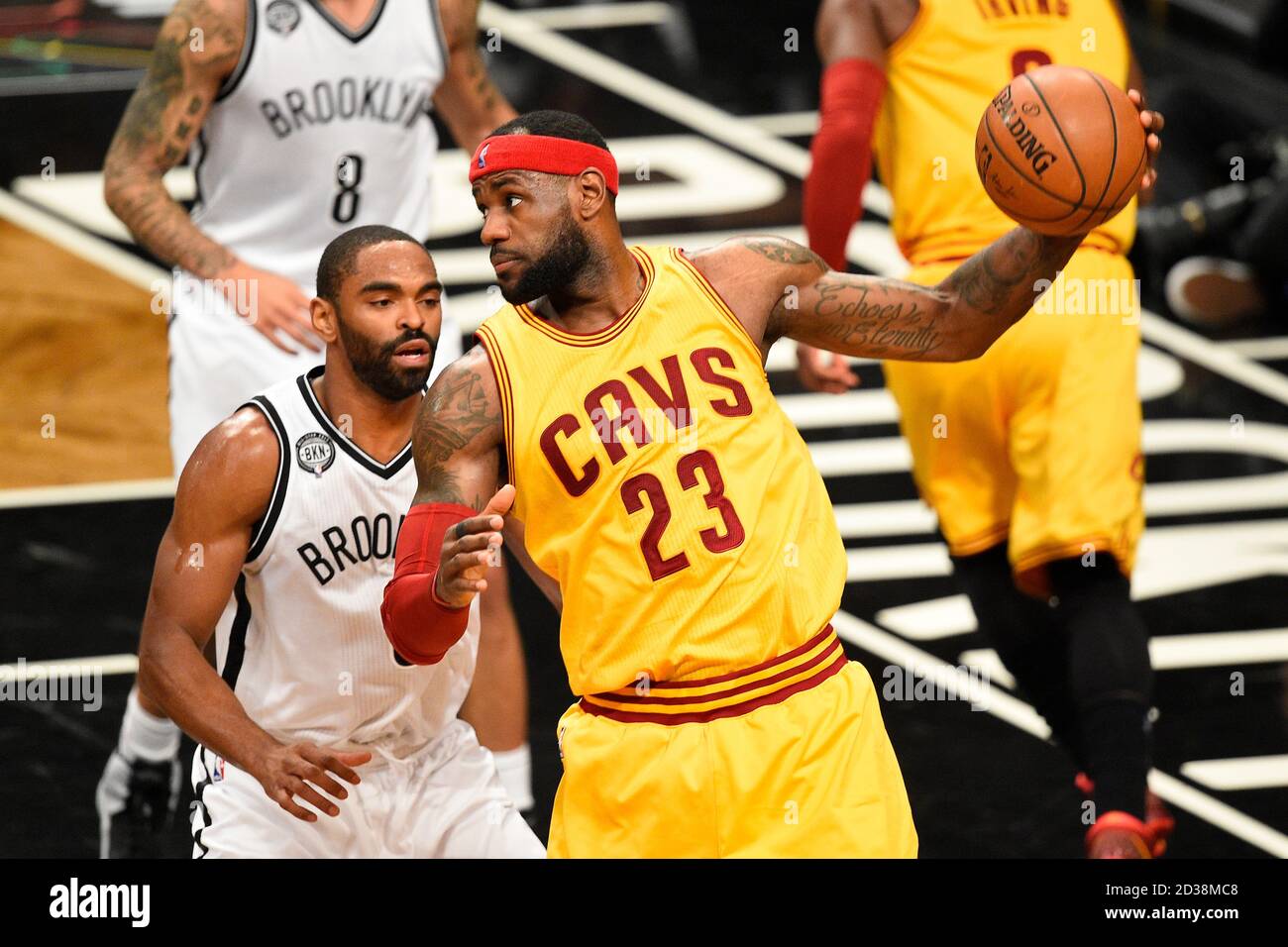 Cleveland Cavaliers forward LeBron James (23) sets himself against Brooklyn Nets guard Alan Anderson (6) in the first half at Barclays Center in New Y Stock Photo