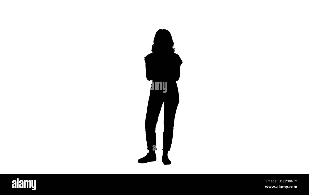 Silhouette Smiling teen girl text messaging on her mobile Stock Photo ...