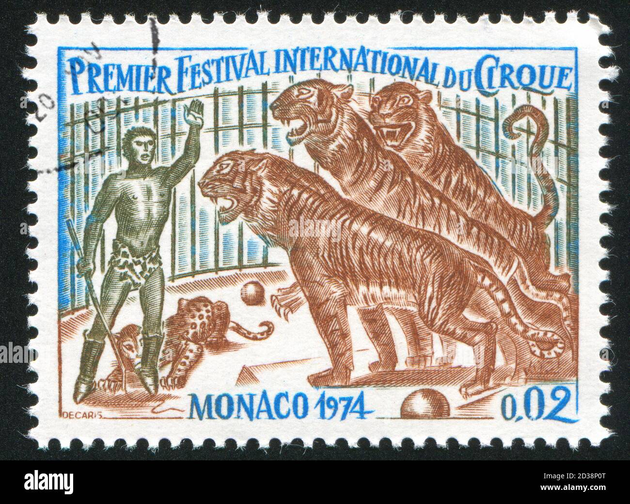 MONACO - CIRCA 1974: stamp printed by Monaco, shows Trainer and Tigers, circa 1974 Stock Photo