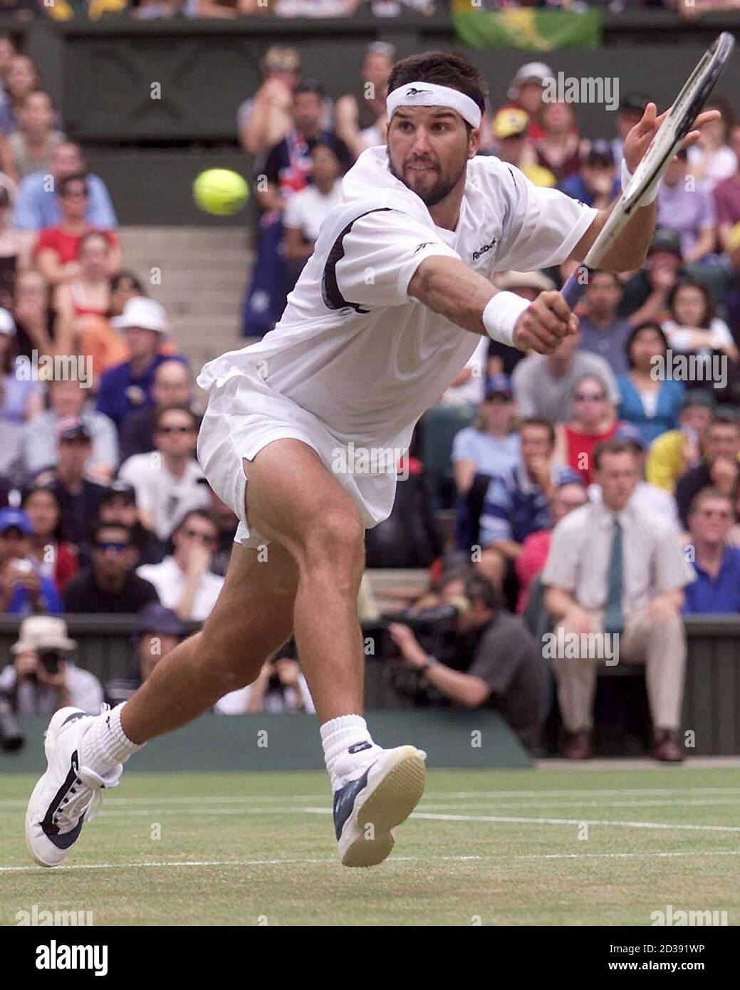 Pat Rafter Of Australia Plays A Return To Croatia s Goran Ivanisevic 
