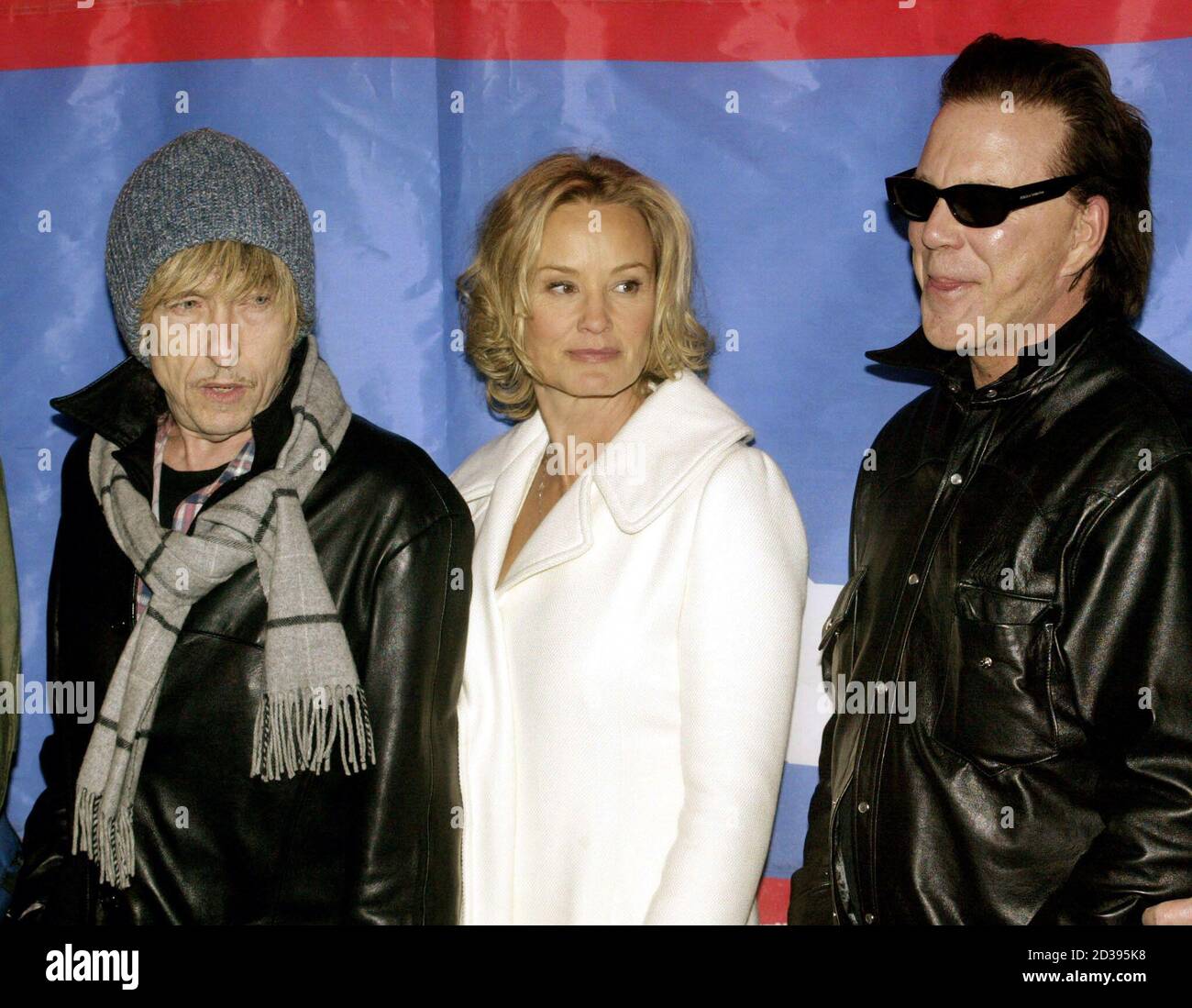 Cast of the film "Masked and Anonymous" (L-R) singer Bob Dylan, Jessica  Lange and Mickey Rourke pose during a photo call for the film in Park City,  Utah January 22, 2003 at