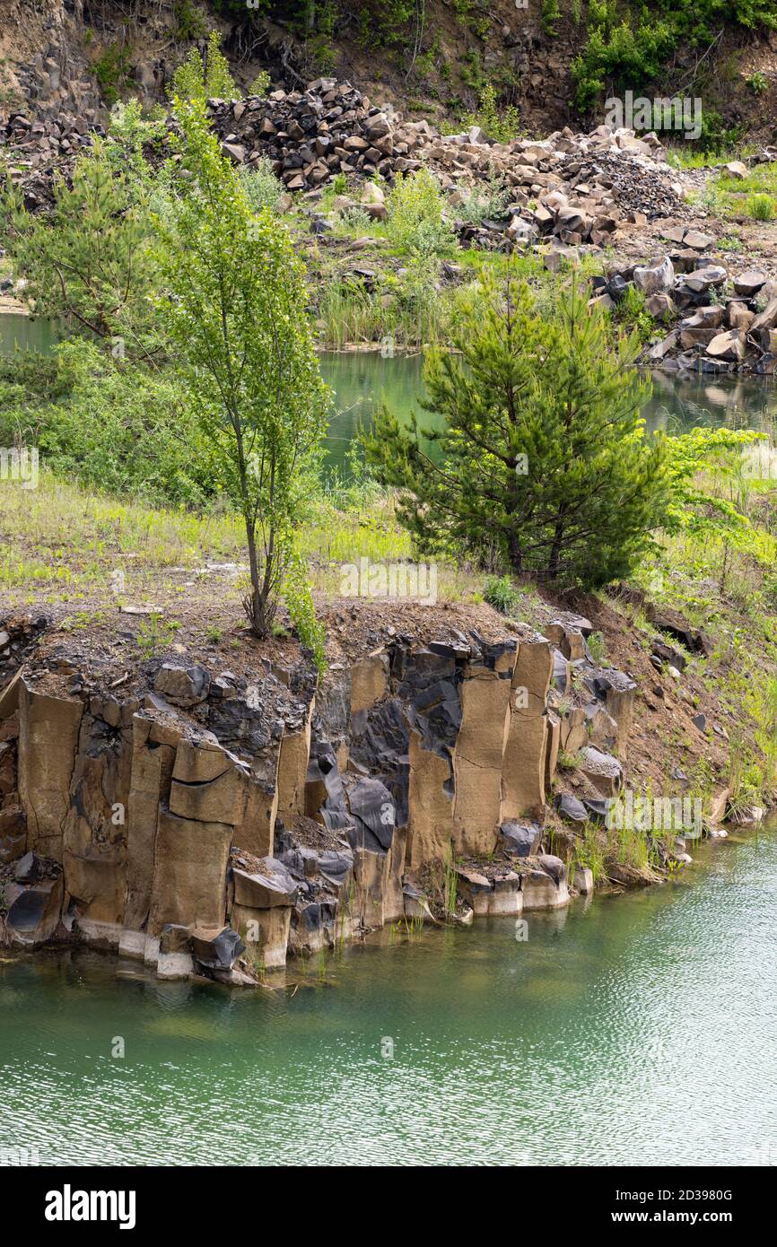 Summer Basalt Pillars Geological Reserve and Basaltove lake, Kostopil district of Rivne region, Ukraine. Stock Photo