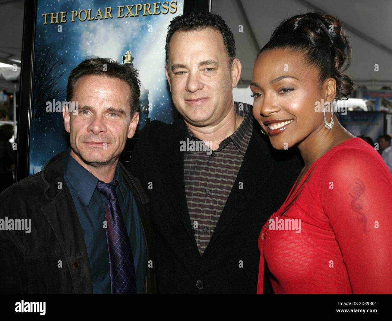 Actors (L-R) Peter Scolari, Tom Hanks and Nona Gaye, stars of the new  computer animated film "The Polar Express" pose a film's premiere in  Hollywood, November 7, 2004. [The film based on