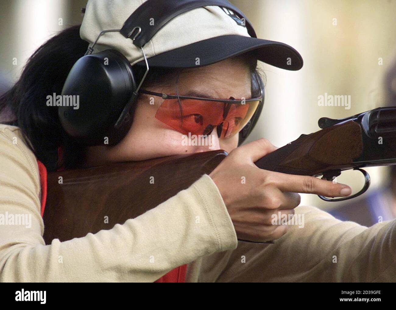 Singaporean Goh Chung Wei Aims During The Women S Team Trap Shooting Event At The Southeast Asian Games In Kuala Lumpur September 8 2001 Wei Scored A Total Of 55 Points To Help