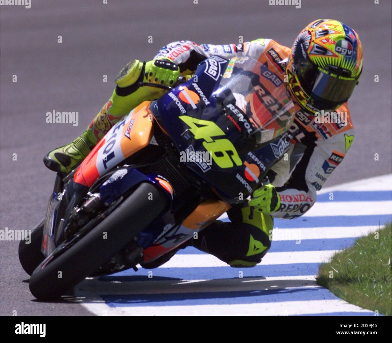Italian MotoGP rider Valentino Rossi, 2001 world champion in the  500cc-class, takes a curve during the first training session ahead of the  Motorcycling Grand Prix at Jerez racetrack May 3, 2002. Rossi