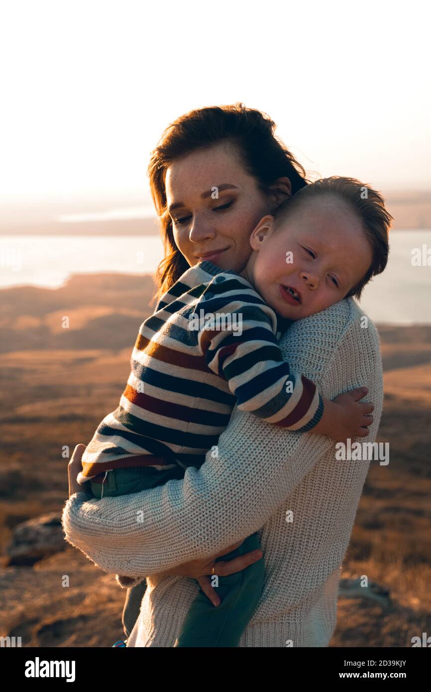 Beautiful mother son in arms hi-res stock photography and images - Alamy