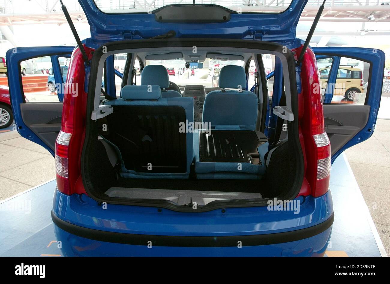 Back view with door open of the new Fiat Panda car are parked in Lisbon  International Fair September 2, 2003, during their first world  presentation. Fiat has said it plans to sell