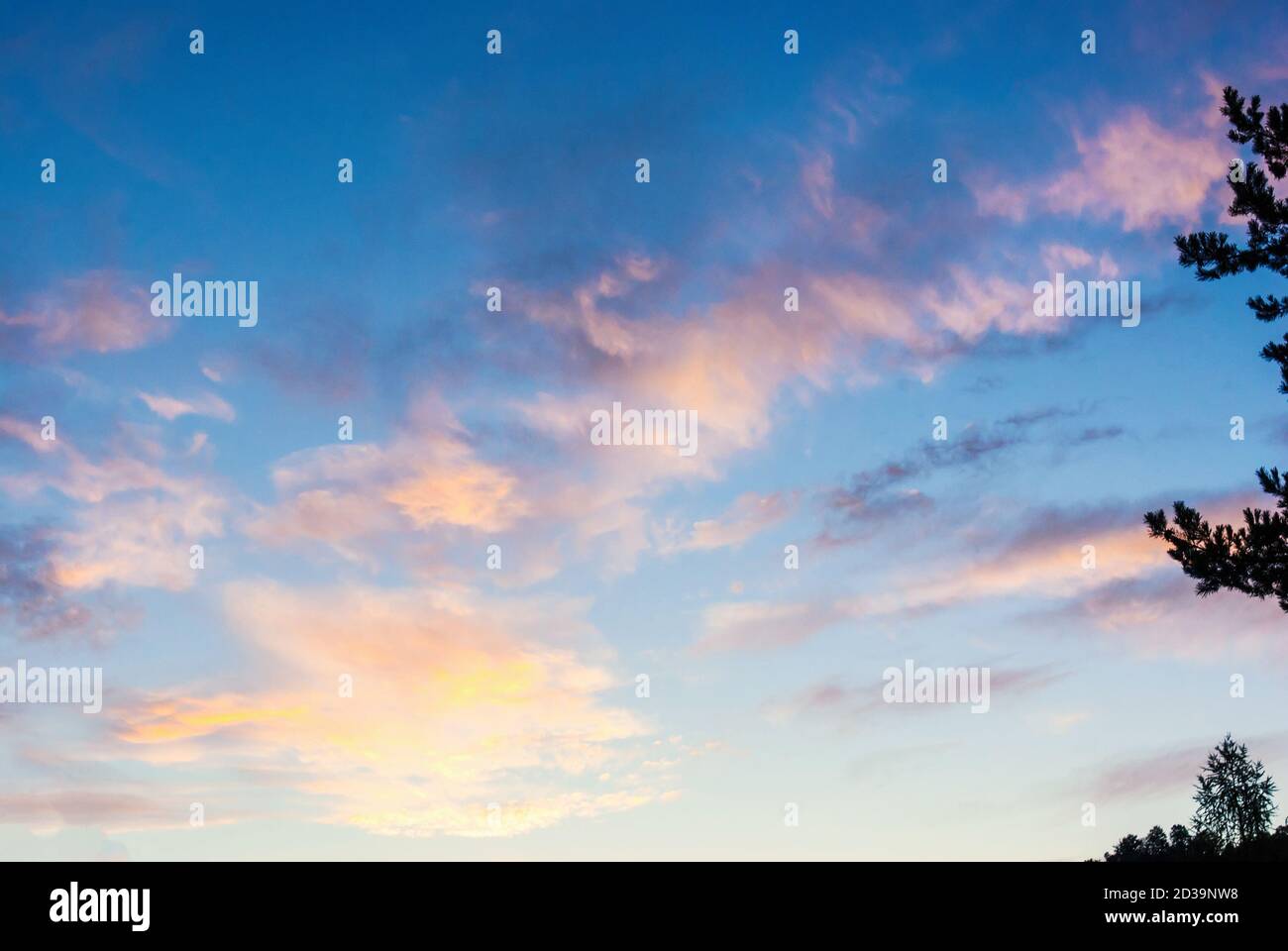 Beautiful blue orange sky with clouds background Stock Photo - Alamy