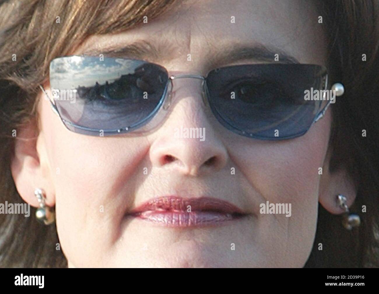 Cherie Blair, wife of Britain's Prime Minister, wears sunglasses as she walks in the early morning sunshine on the second day of the Labour Party conference in Bournemouth September 29, 2003. REUTERS/Stephen Hird  RUS/CRB Stock Photo