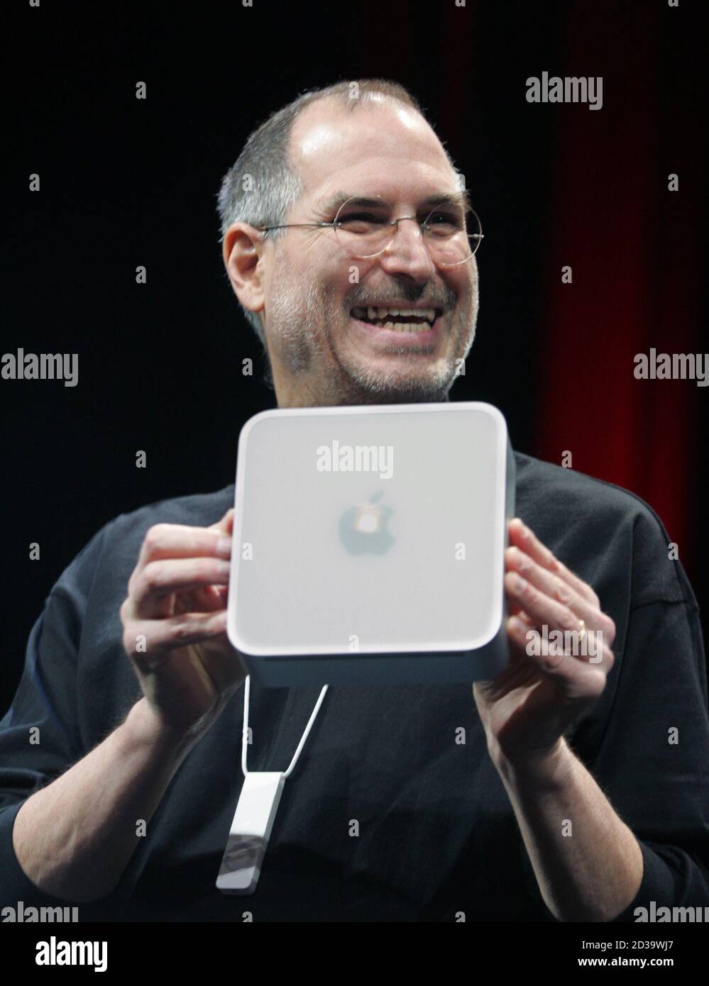 Apple Ceo Steve Jobs Holds Up Apple S New Mini Mac Computer Which He Introduced At The Macworld Conference In San Francisco January 11 05 The Mini Mac Is A Very Small 499