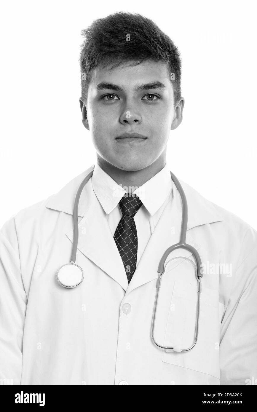 Studio shot of young handsome man doctor Stock Photo