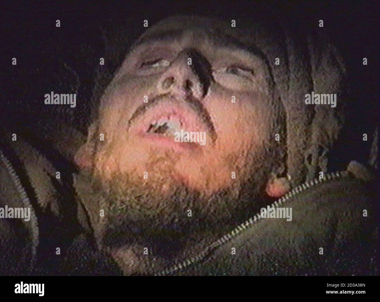 VIDEO IMAGE 24DEC01 - The body of a man, identified as Herve Djamel Loiseau  by the papers he was carrying, is pictured in Parachinar, Pakistan on  December 24, 2001. The frozen