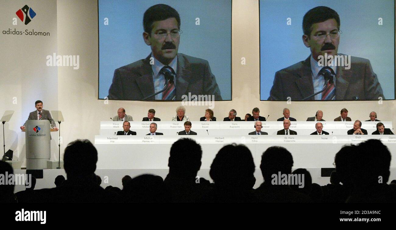 Herbert Hainer CEO of Adidas-Salomon, the world's second-biggest sports  goods maker, is seen on two large screens during his speech at the  company's annual shareholder meeting in Fuerth May 13, 2004.  REUTERS/Michaela